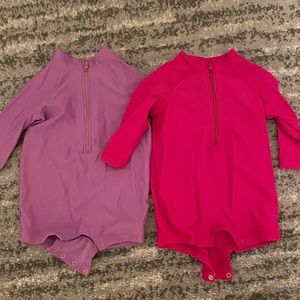 Two Primary rash guards swim suits size 0-6 months